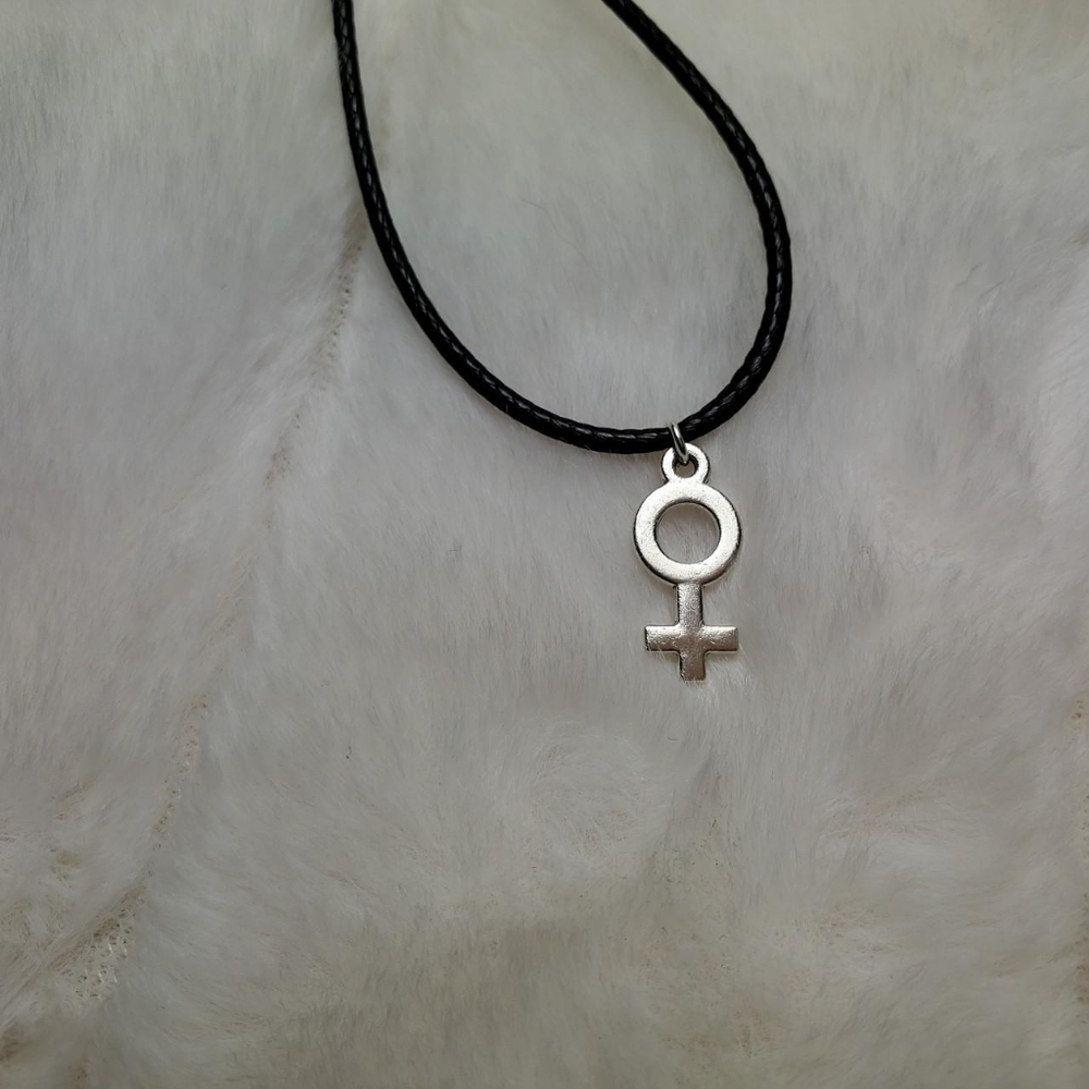 Female symbol necklace